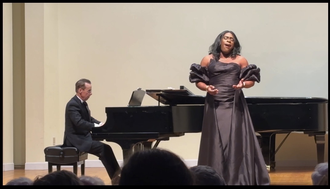 Xavier Williams performing with piano